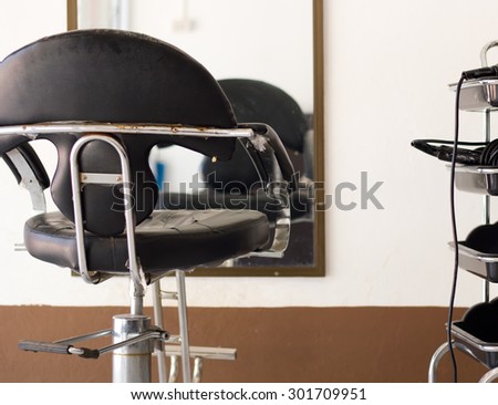 The black chair in beauty salon