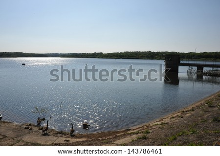 The Weir Reservoir at East Grinstead, Sussex, England. Maximum water capacity is 1,237, 000,000 gallons of water.