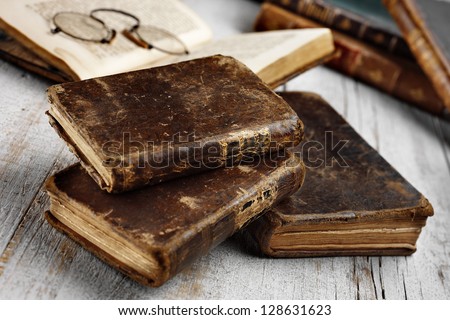 Antique Books On Aged White Table