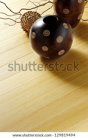 light bamboo floor with wooden ornaments