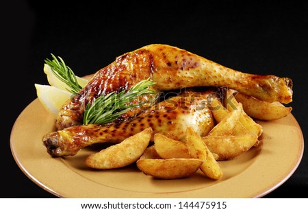 roast turkey drumsticks with fried potatoes