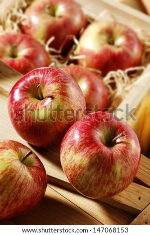 fuji apples in wooden box