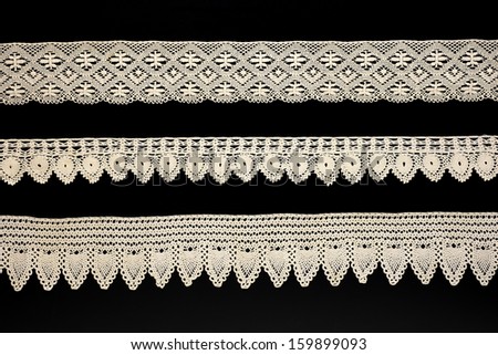 vintage bobbin lace borders on black background