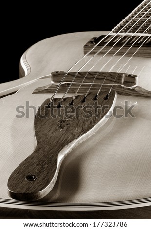 tailpiece jazz guitar with six strings