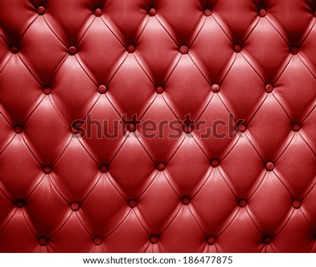 english red genuine leather upholstery, chesterfield style background