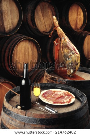 sherry wine cellar with iberian cured ham