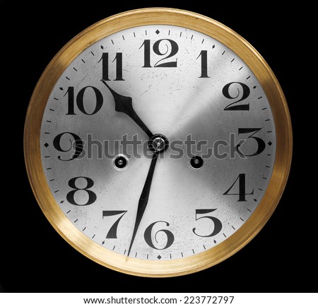 old clock face at half past ten