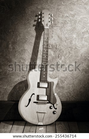 vintage jazz electric guitar in jazz club interior