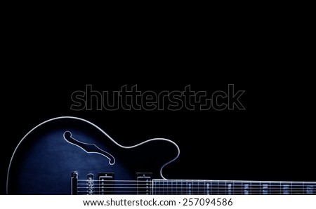 blues classic guitar shape on black background