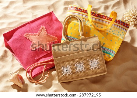 woman beach bags on the sand, summer accessories
