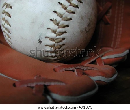 macro of baseball glove and baseball