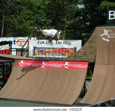 Extreme skateboarder getting big air at Muskoka Woods Amateur Open in Ontario