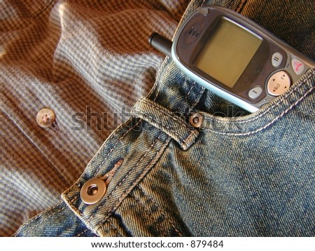 cell phone in front of jeans pocket
