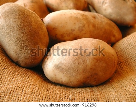 potatoes spilling out of burlap bag