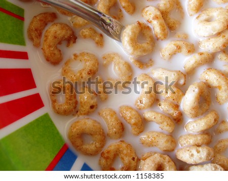the next bite of cereal being eaten out of a bowl