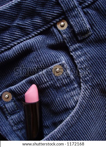 lipstick tucked in the front pocket of womans pants