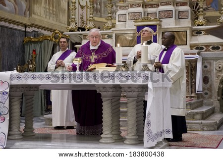 GENOA, ITALY - MARCH 22, 2014: Bishop and priest officiating Mass for confirmation in the Church of Santa Maria dell\'Assunta in Sestri Ponente, Genoa, Italy.