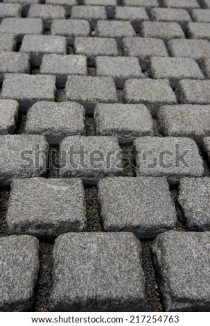 Construction of a new pavement in Skofja Loka with granite blocks.