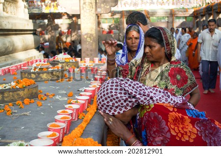 GAYA,INDIA - 14 MAY 2014 : Women pray for holy spirit on Buddha\'s Birthday  ritual anniversary at Mahabodhi Gaya Temple on 14 May 2014 ,Gaya India