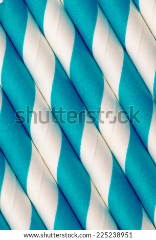 Blue and white paper straw closeup background vintage