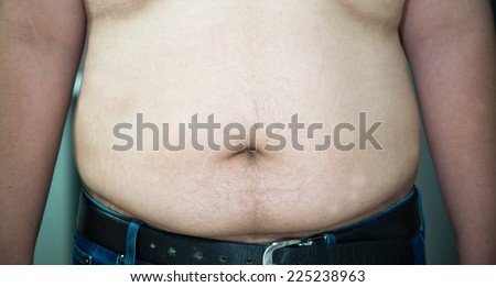 Fat male show his stomach wear belt with  jeans