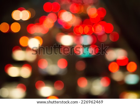 Blur bokeh of traffic jam in city at night background