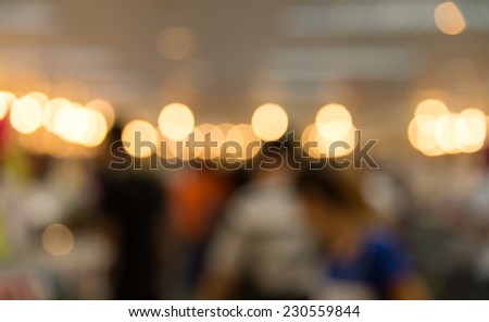 Blur crowded people with light in urban lifestyle vintage tone