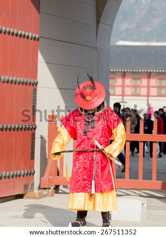 Seoul, Republic of Korea - December 31,2014 : Unknown male in ancient Korean soldier costume around Gyeongbokgung palace  for tourist attraction  in Seoul, South Korea