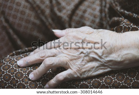 Asian old woman 's hand closeup look like old image