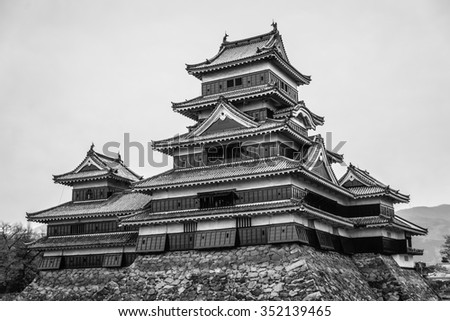 Masumoto Castle , Black palace for war in autumn at nagano province in  Japan with clear sky black and white tone