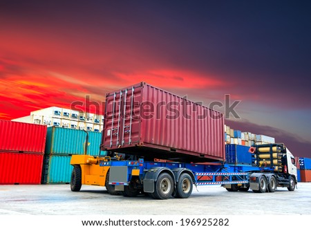 Forklift handling the container box up Truck at docks