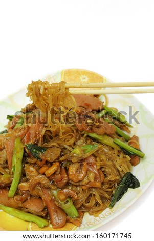 Chinese Fried Noodle with chopstick isolated on white
