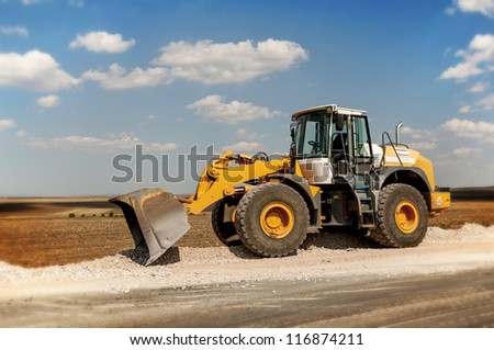 Construction and repair of roads and highways. Support activities for the construction of roads and highways. Road under construction.