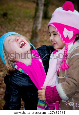 portrait of children with fall clothes in nature