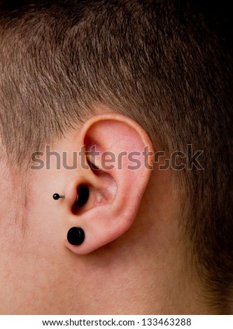 little kid with gauges
