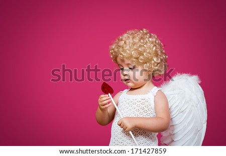 baby cupid with an arrow and wings