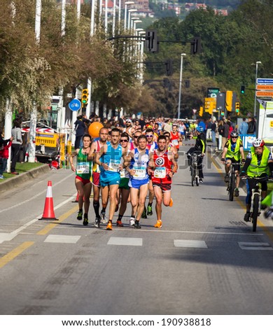 GIJON, SPAIN - MAY 3, 2014: Participants in the annual half marathon in the city of Gijon, Spain, on Saturday, May 3, 2014.