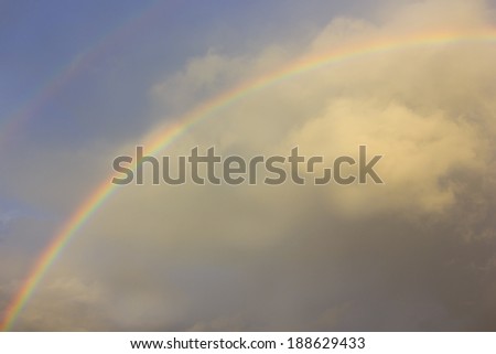 Double Rainbow in a Cloudy Sky