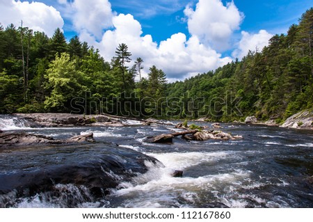 One of the many whitewater rapids of  the Chattooga Wild and Scenic River.  The movie Deliverance was filmed on this river.