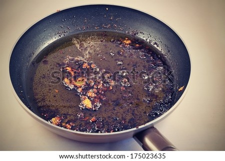 dirty dishes - pan with grease
