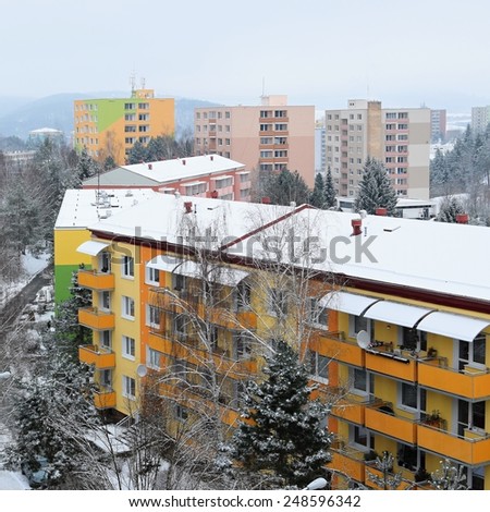 Prefabricated houses in winter.\
Renovated - reconstructed houses.