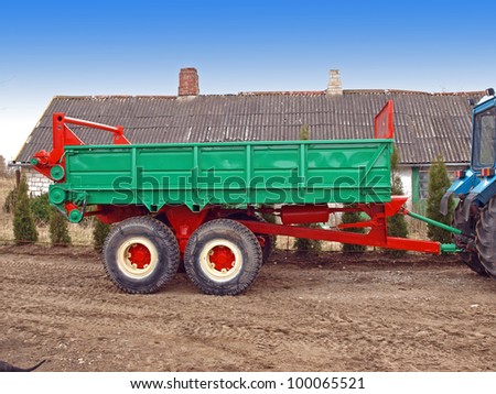 Tractor powered manure spreader, color, after repairing