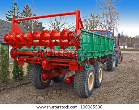 Tractor powered manure spreader, color, after repairing