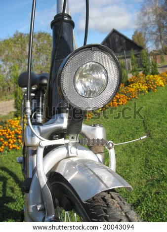 Black color bicycle front light , close up