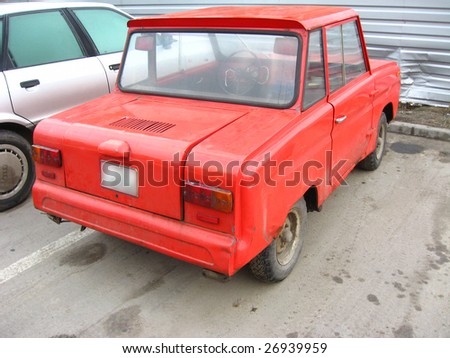 Red russian car, made specially for disabled persons