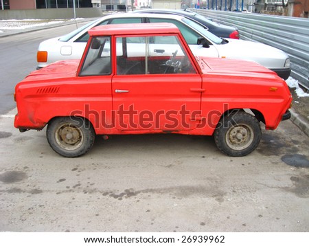 Red russian car, made specially for disabled persons