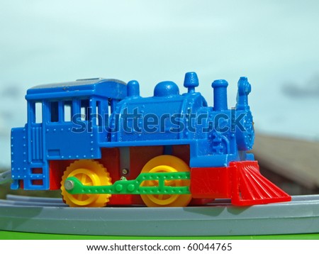 Plastic toy train steam engine locomotive, close up