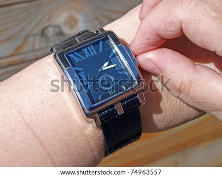 Setting time on big rectangle hand watch