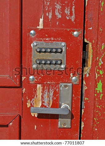Forced red wooden doors with code lock