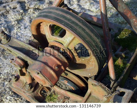 Old tractor mower transmission from three v-belts